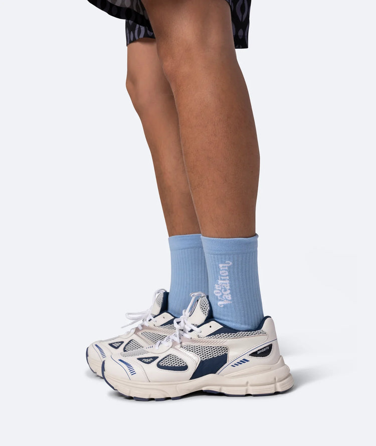 Tennissocken mit dem Schriftzug oder Statement "On Vacation"