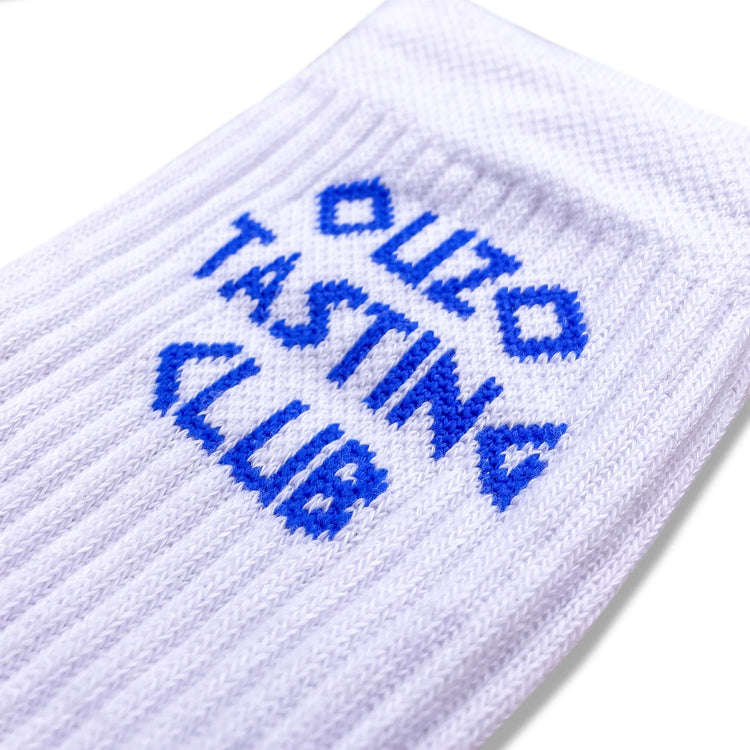 Tennissocken mit dem Schriftzug oder Statement "OUZO TASTING CLUB"
